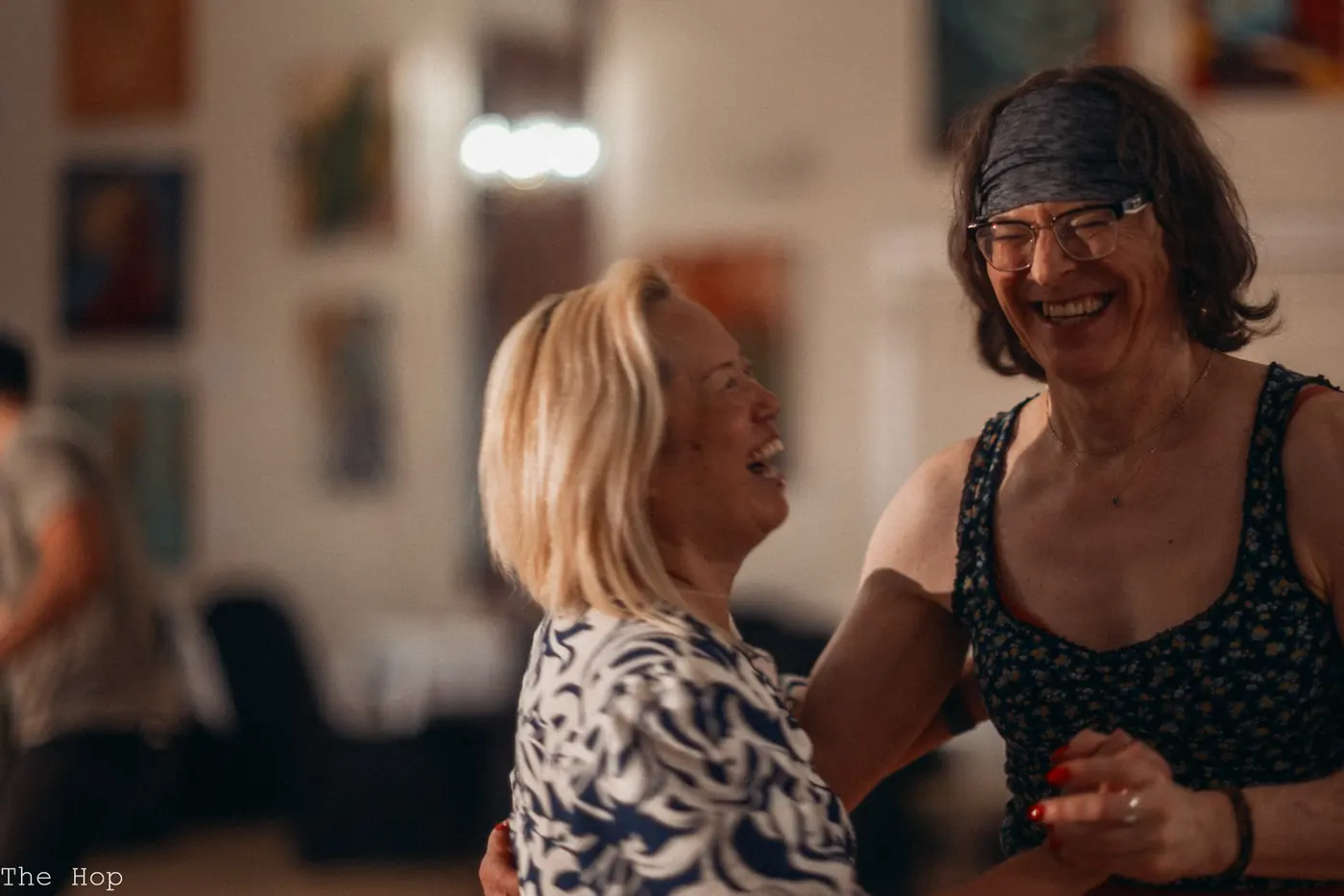Two dancers laughing together